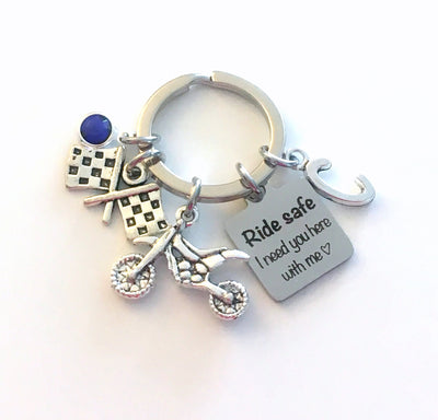 This Dirt bike Keychain is the perfect gift for any motocross enthusiast.   This key chain is perfect for any occasion, whether it's a birthday, anniversary, or just to show your appreciation. It's a great way to show your support for your favorite rider or team and remind your loved ones to stay safe.